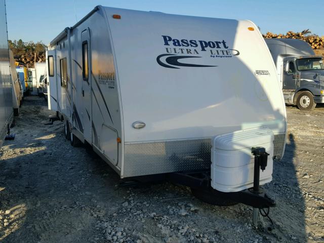 4YDT2852696411426 - 2009 KEYSTONE PASSPORT WHITE photo 1