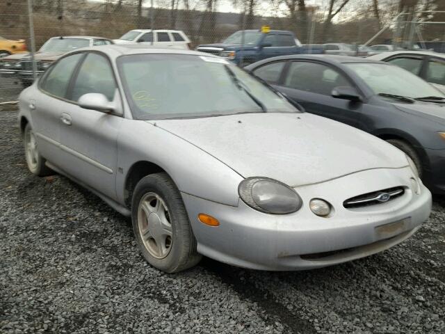 1FAFP53S9XA175244 - 1999 FORD TAURUS SE SILVER photo 1