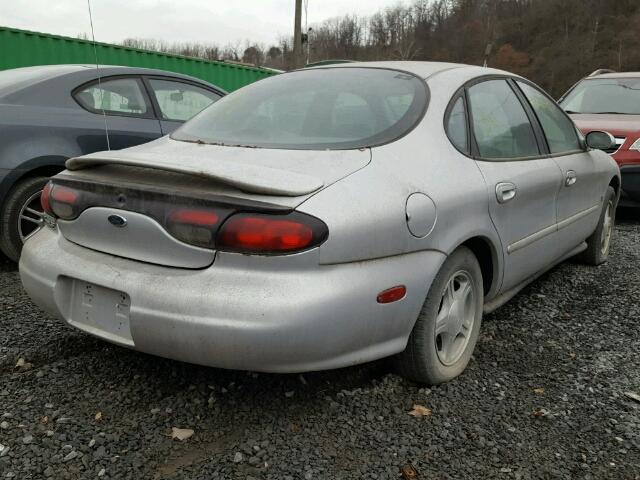 1FAFP53S9XA175244 - 1999 FORD TAURUS SE SILVER photo 4