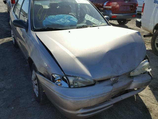 1Y1SK5285WZ441061 - 1998 CHEVROLET GEO PRIZM SILVER photo 1