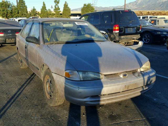 1Y1SK5280WZ437998 - 1998 CHEVROLET GEO PRIZM SILVER photo 1