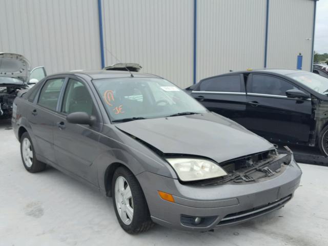 1FAHP34N87W271682 - 2007 FORD FOCUS ZX4 GRAY photo 1