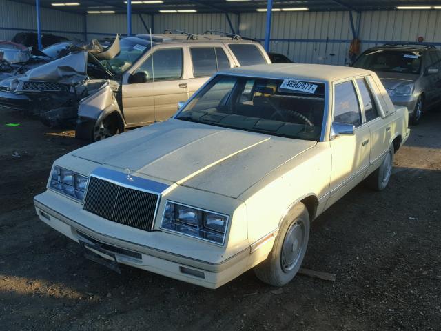 1C3BC46B3CC260383 - 1982 CHRYSLER LEBARON YELLOW photo 2