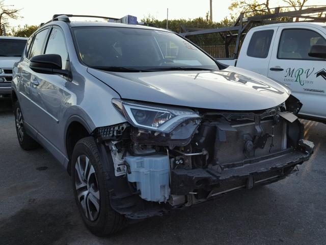 2T3ZFREV0GW240721 - 2016 TOYOTA RAV4 LE SILVER photo 1