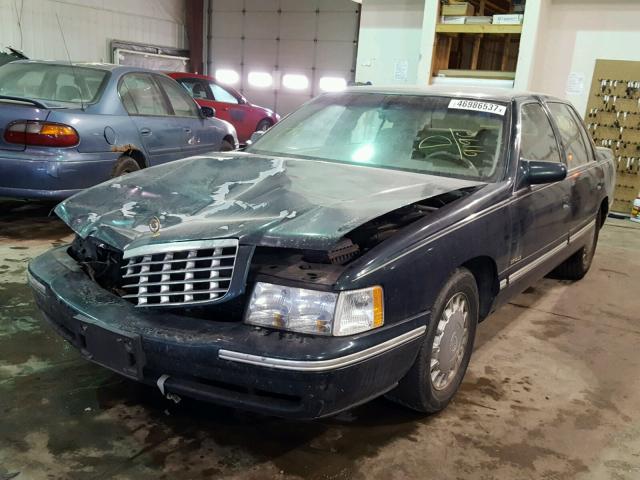 1G6KD54Y9VU289196 - 1997 CADILLAC DEVILLE GREEN photo 2