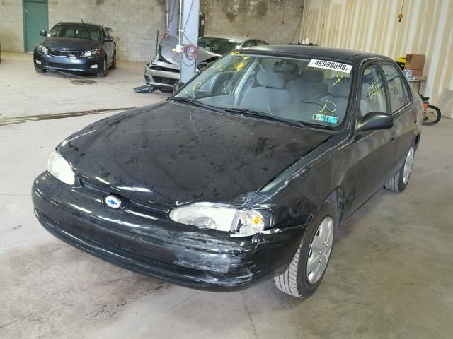 1Y1SK52851Z428707 - 2001 CHEVROLET GEO PRIZM BLACK photo 2