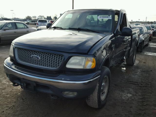 1FTRX18W4XNB62227 - 1999 FORD F150 BLUE photo 2