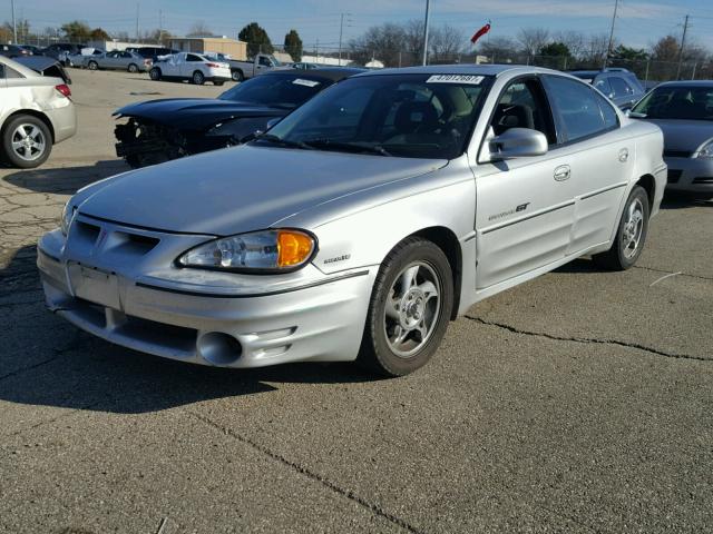 1G2NW52E72M574976 - 2002 PONTIAC GRAND AM G SILVER photo 2