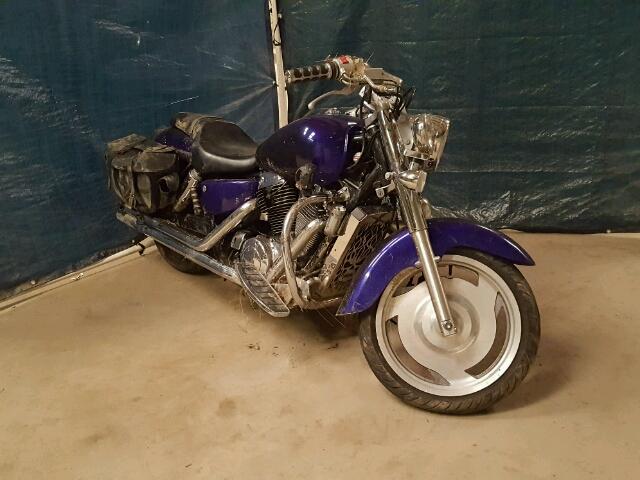 1HFSC43012A202688 - 2002 HONDA VT1100 C2 PURPLE photo 1