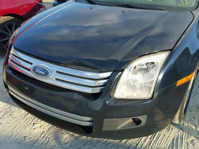 3FAHP07Z09R205856 - 2009 FORD FUSION SE BLUE photo 9