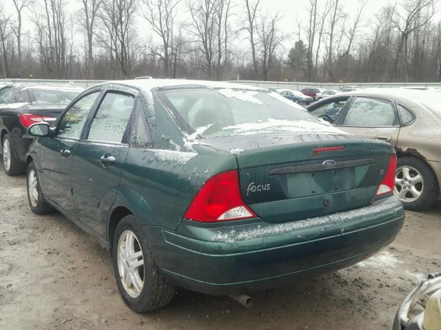 1FAFP3437YW307580 - 2000 FORD FOCUS SE GREEN photo 3