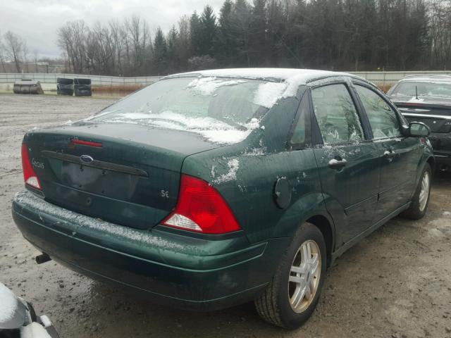 1FAFP3437YW307580 - 2000 FORD FOCUS SE GREEN photo 4