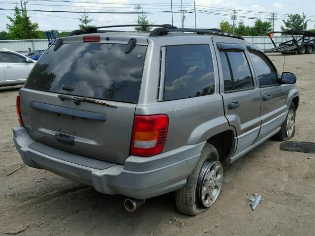 1J4GW58S3XC760586 - 1999 JEEP GRAND CHER GRAY photo 4