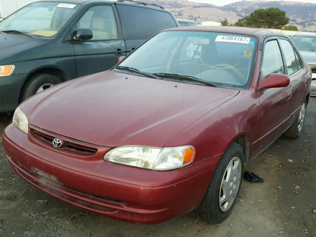 1NXBR12E0XZ245165 - 1999 TOYOTA COROLLA RED photo 2