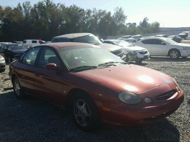 1FAFP53SXXA234530 - 1999 FORD TAURUS SE BURGUNDY photo 1