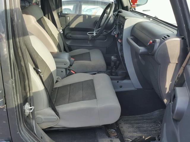 1J4BA3H17AL137483 - 2010 JEEP WRANGLER U BLACK photo 5