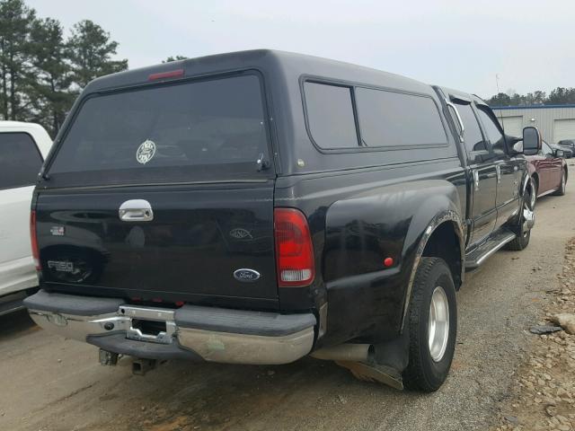 1FTWW32P03ED37232 - 2003 FORD F350 SUPER BLACK photo 4