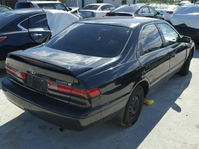 4T1BG22K5XU407793 - 1999 TOYOTA CAMRY CE BLACK photo 4