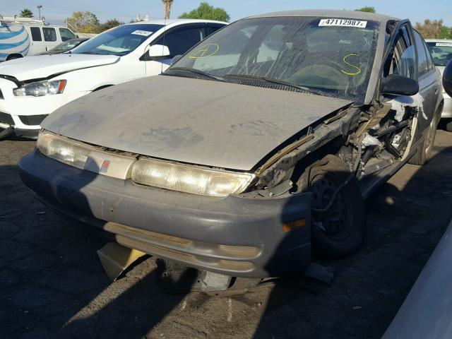 1G8ZH5285XZ255940 - 1999 SATURN SL1 BEIGE photo 2