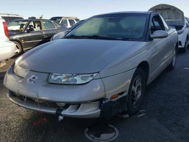 1G8ZY1275XZ298321 - 1999 SATURN SC2 GOLD photo 2