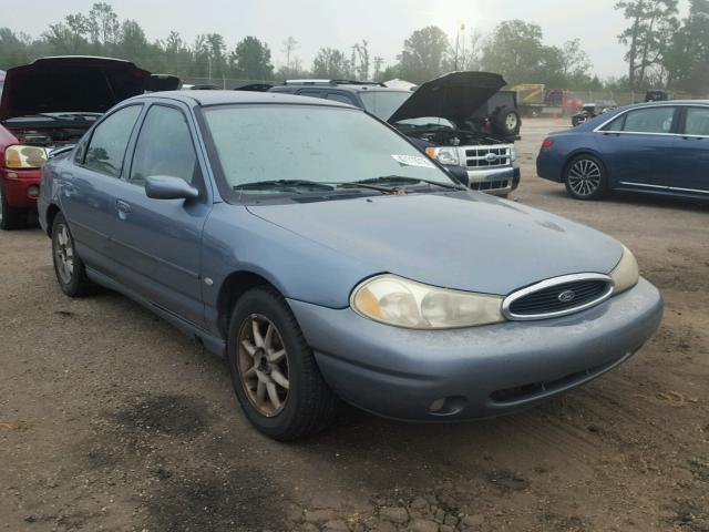 3FAFP66LXXM104647 - 1999 FORD CONTOUR SE BLUE photo 1