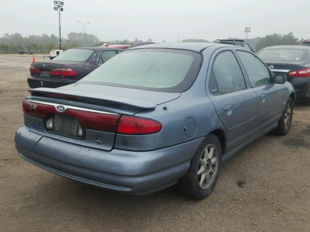 3FAFP66LXXM104647 - 1999 FORD CONTOUR SE BLUE photo 4