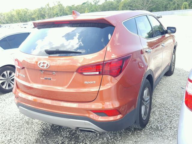 5XYZT3LB5HG396509 - 2017 HYUNDAI SANTA FE S ORANGE photo 4