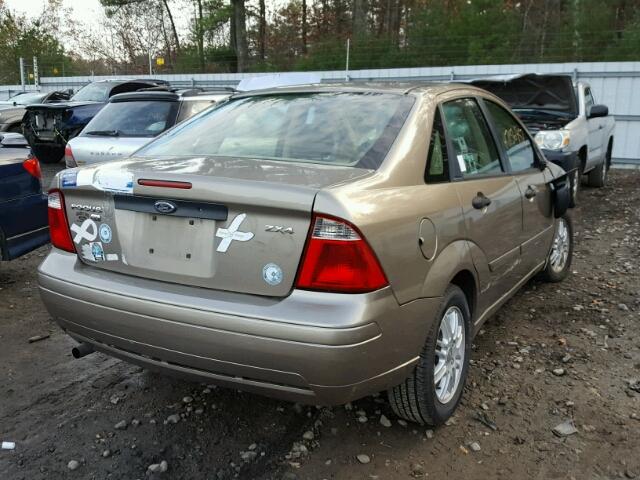 1FAFP34N95W257066 - 2005 FORD FOCUS ZX4 TAN photo 4