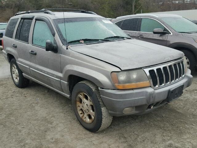 1J4GW58S7XC616300 - 1999 JEEP GRAND CHER GRAY photo 1