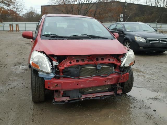 JTDBT923281229085 - 2008 TOYOTA YARIS RED photo 9