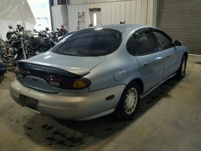 1FALP53S2VA150783 - 1997 FORD TAURUS LX BLUE photo 4