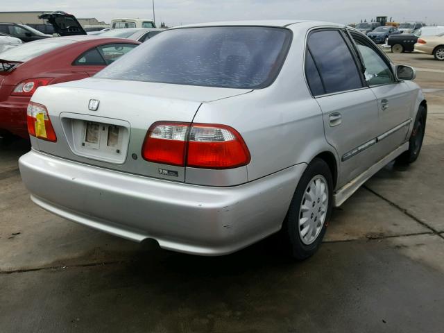 2HGEJ6670XH534097 - 1999 HONDA CIVIC LX SILVER photo 4