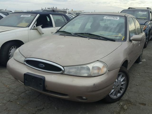 1FAFP6639XK212541 - 1999 FORD CONTOUR SE TAN photo 2