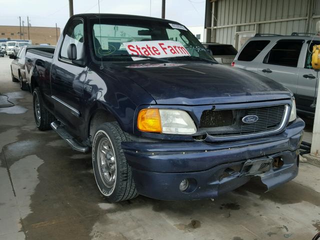 2FTRF17294CA91688 - 2004 FORD F-150 HERI BLUE photo 1