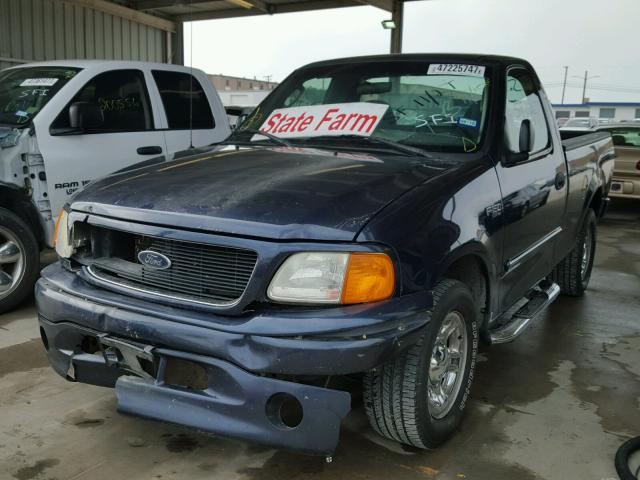 2FTRF17294CA91688 - 2004 FORD F-150 HERI BLUE photo 2