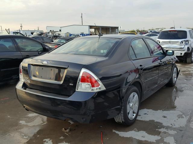 3FAHP071X9R114555 - 2009 FORD FUSION SE BLACK photo 4