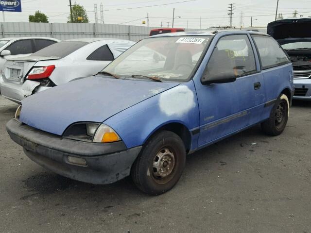 JG1MS2164KK733632 - 1989 GEO METRO BLUE photo 2