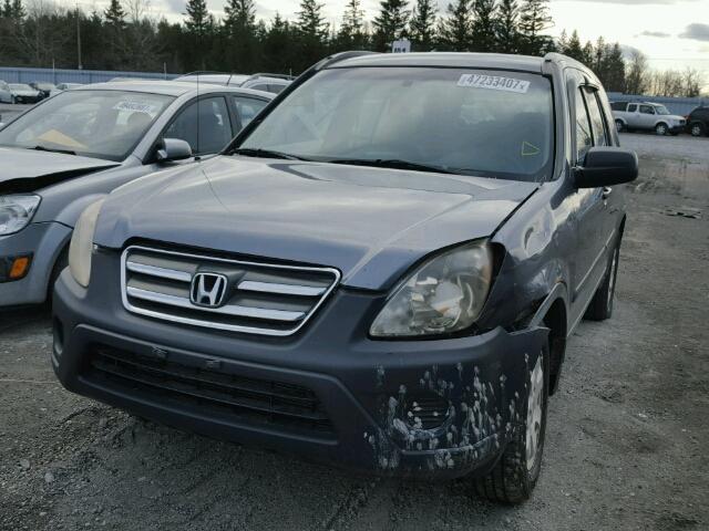 JHLRD78585C809677 - 2005 HONDA CR-V LX SILVER photo 2