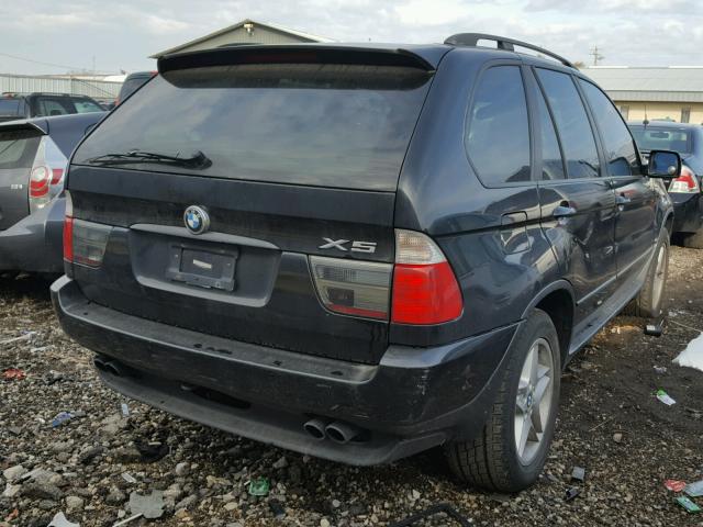 5UXFB33592LH39349 - 2002 BMW X5 4.4I BLACK photo 4