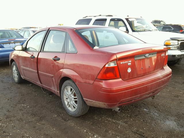 1FAFP34N15W119571 - 2005 FORD FOCUS ZX4 BURGUNDY photo 3