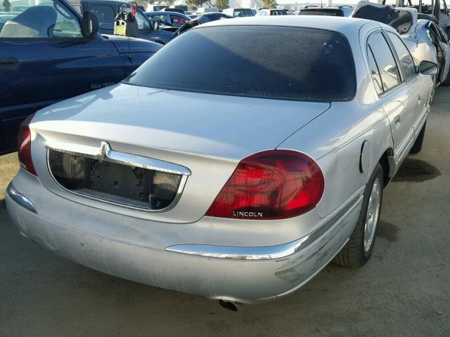 1LNFM97V2WY647879 - 1998 LINCOLN CONTINENTA GRAY photo 4