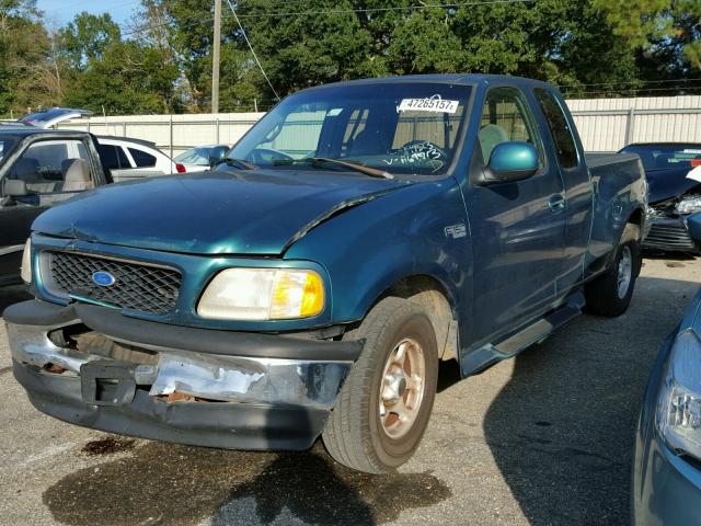 1FTDX07WXVKA64713 - 1997 FORD F150 GREEN photo 2