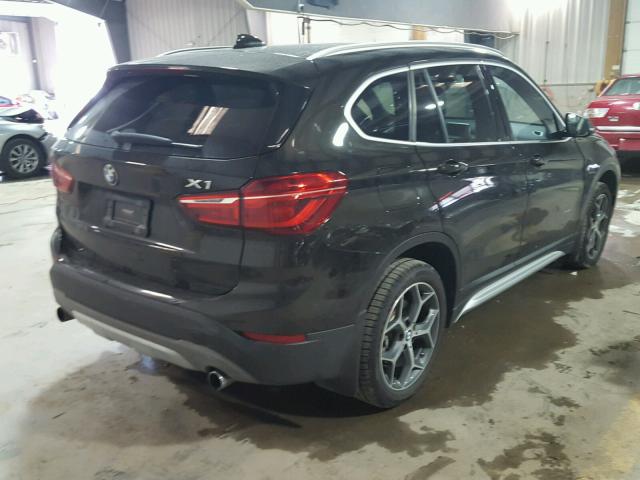 WBXHT3C3XG5E47634 - 2016 BMW X1 XDRIVE2 BLACK photo 4