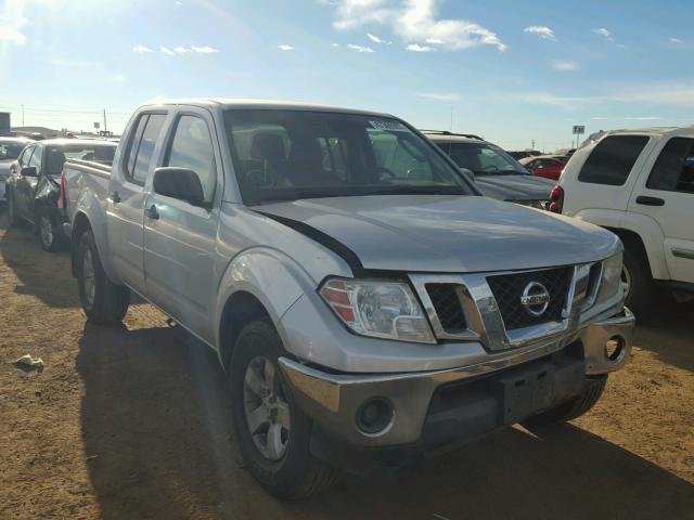 1N6AD07WX9C401924 - 2009 NISSAN FRONTIER C SILVER photo 1