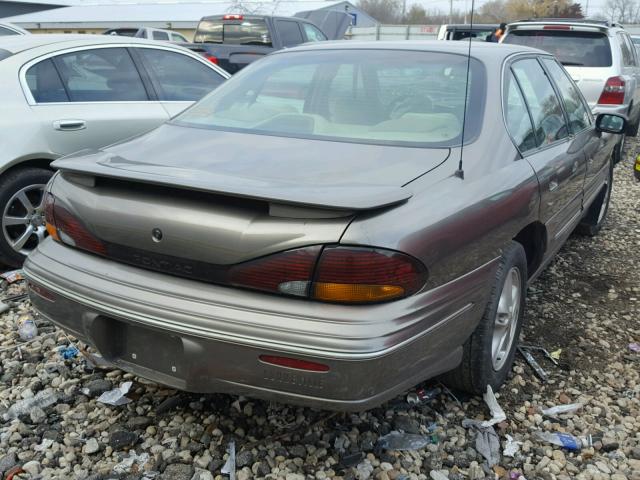 1G2HX52K5XH245287 - 1999 PONTIAC BONNEVILLE GRAY photo 4