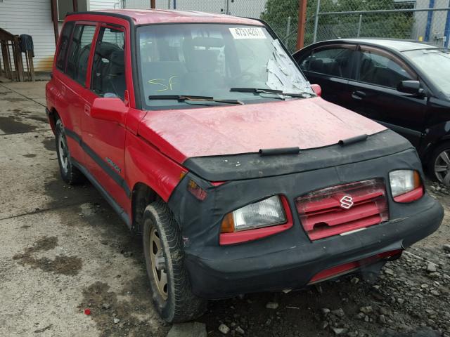 2S3TD03V2V6401283 - 1997 SUZUKI SIDEKICK J RED photo 1