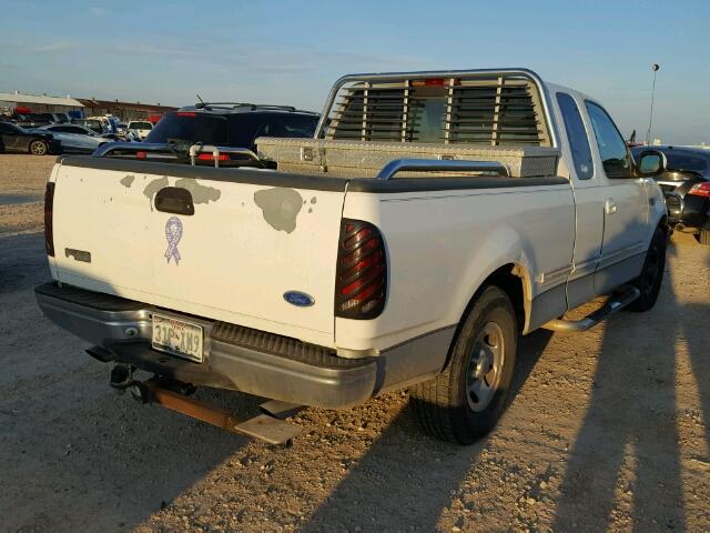 1FTDX1768VKA46507 - 1997 FORD F150 WHITE photo 4