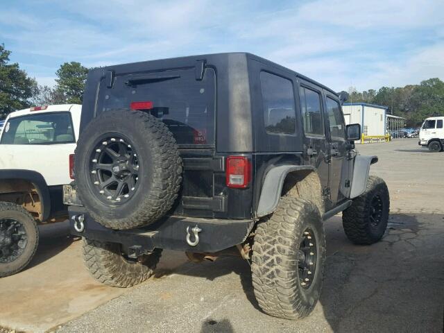 1J4GA69118L648526 - 2008 JEEP WRANGLER U BLACK photo 4