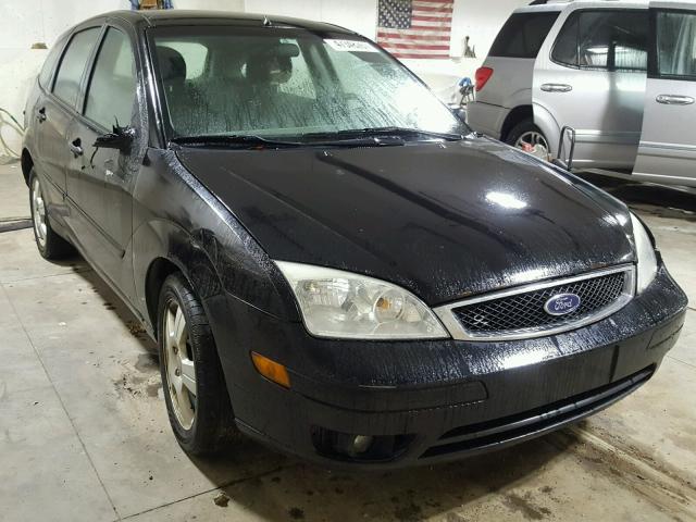 1FAHP37N17W103703 - 2007 FORD FOCUS ZX5 BLACK photo 1