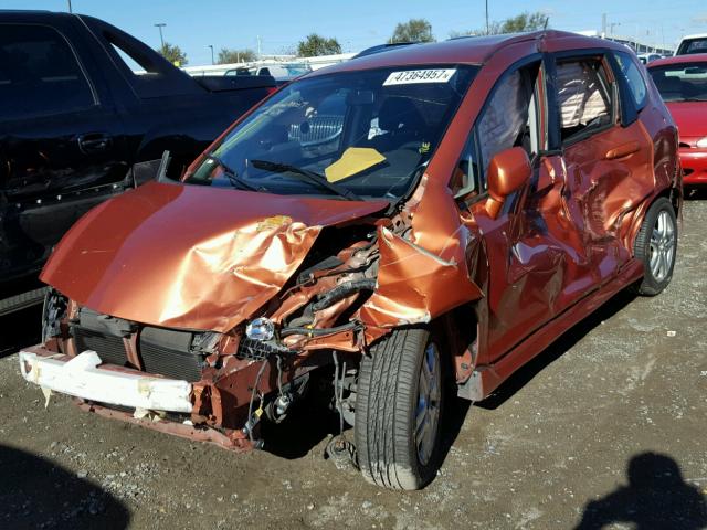 JHMGD37628S027519 - 2008 HONDA FIT SPORT ORANGE photo 2